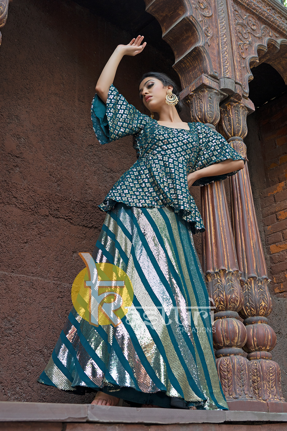 Blue embroiderd sequins work top and lehenga skirt