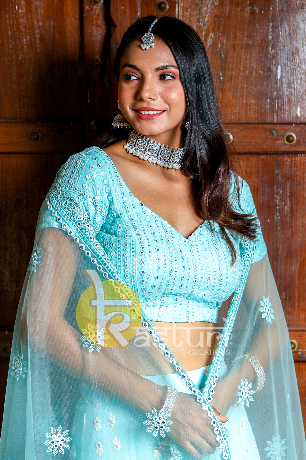 Blue mirror work embroidered georgette lehenga choli set