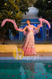 Pink sequence work embroidered net lehenga choli set