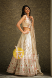 Cream color heavy embroidered georgette lehenga choli set