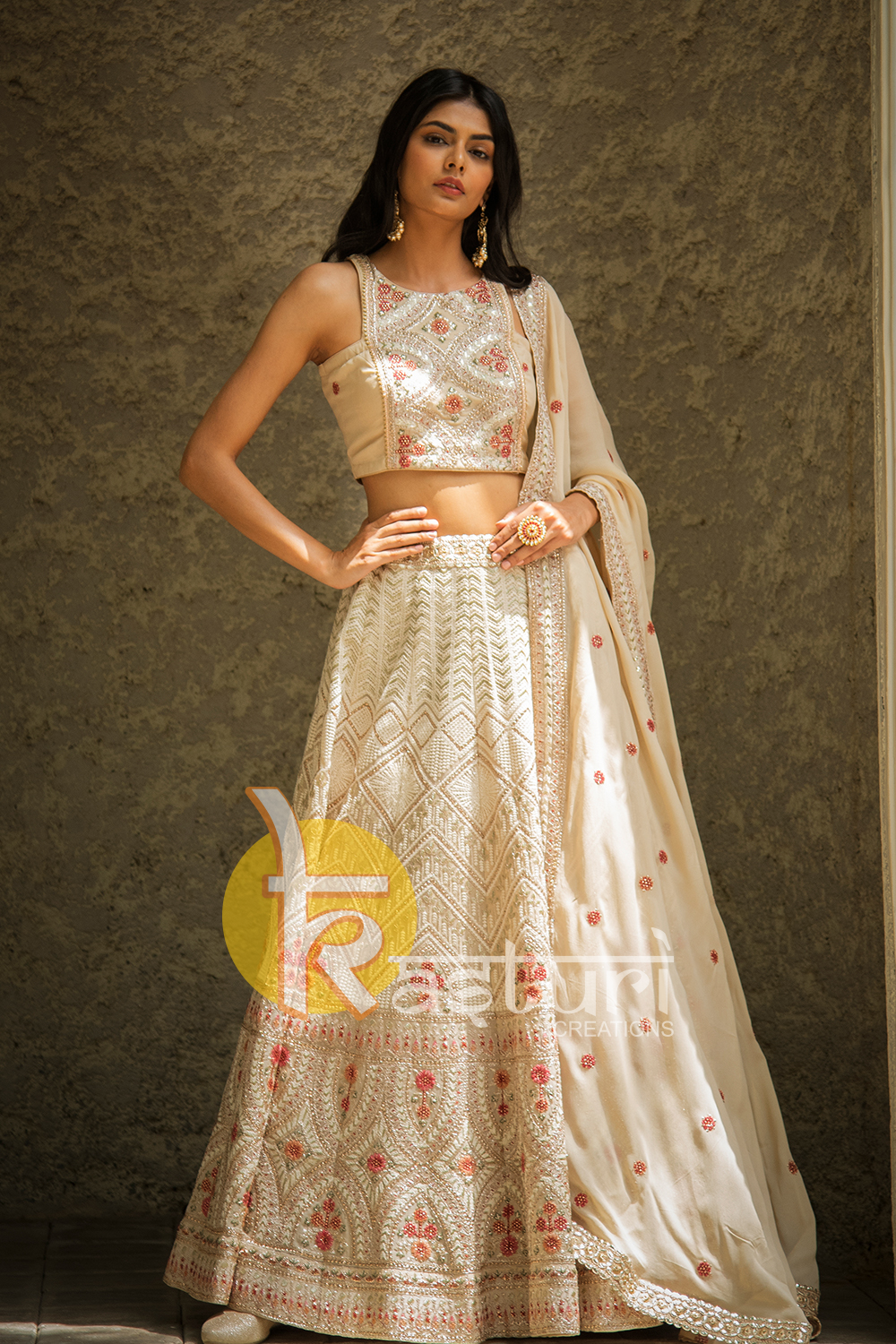 Cream color heavy embroidered georgette lehenga choli set