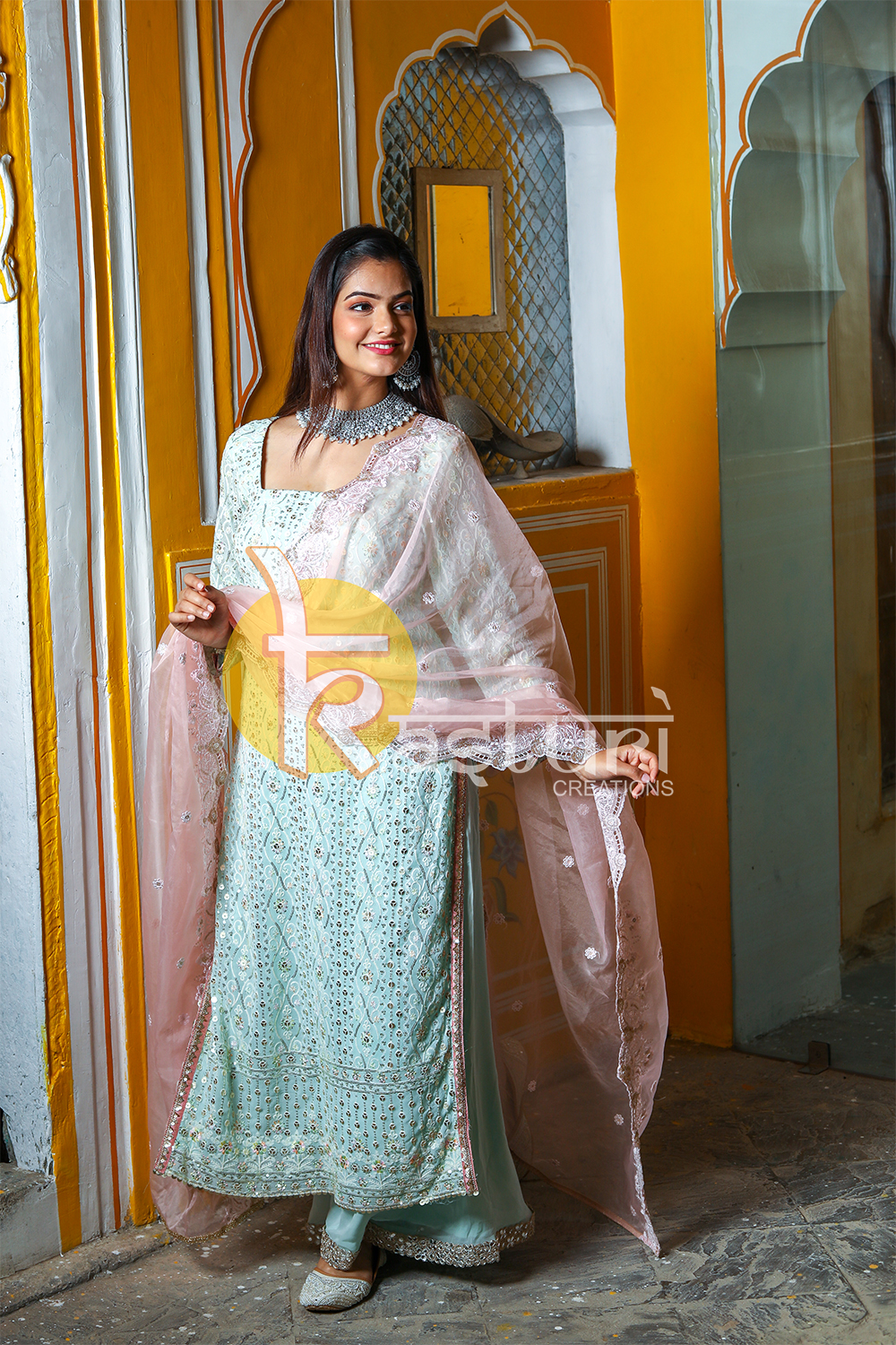 Firozi and pink sequence embroidery georgette kurta and palazzo set