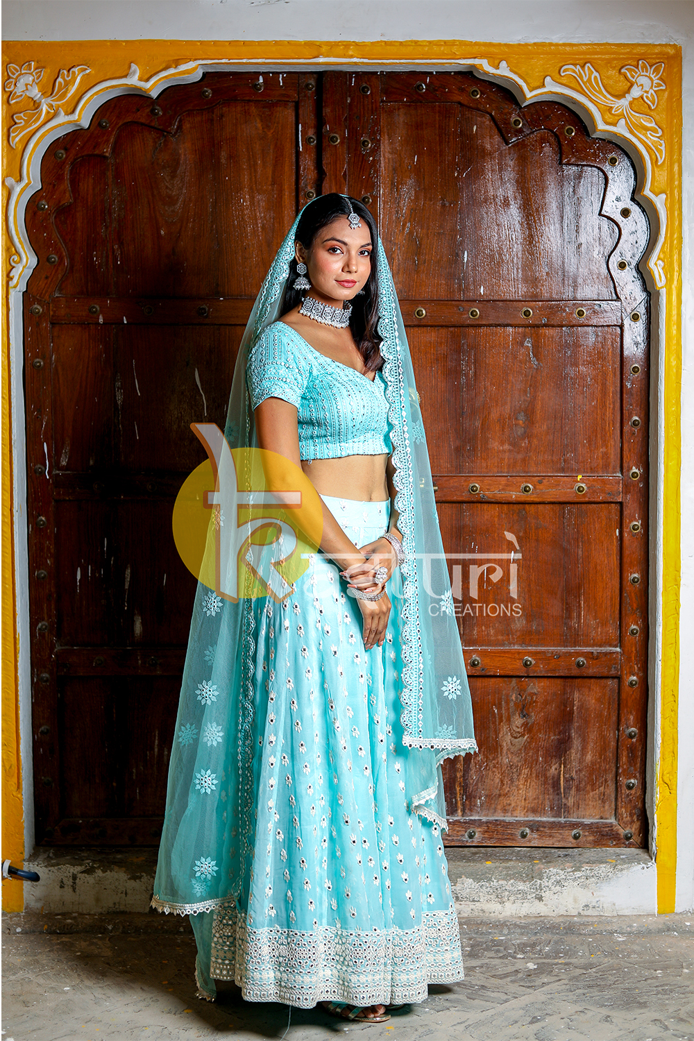 Blue mirror work embroidered georgette lehenga choli set