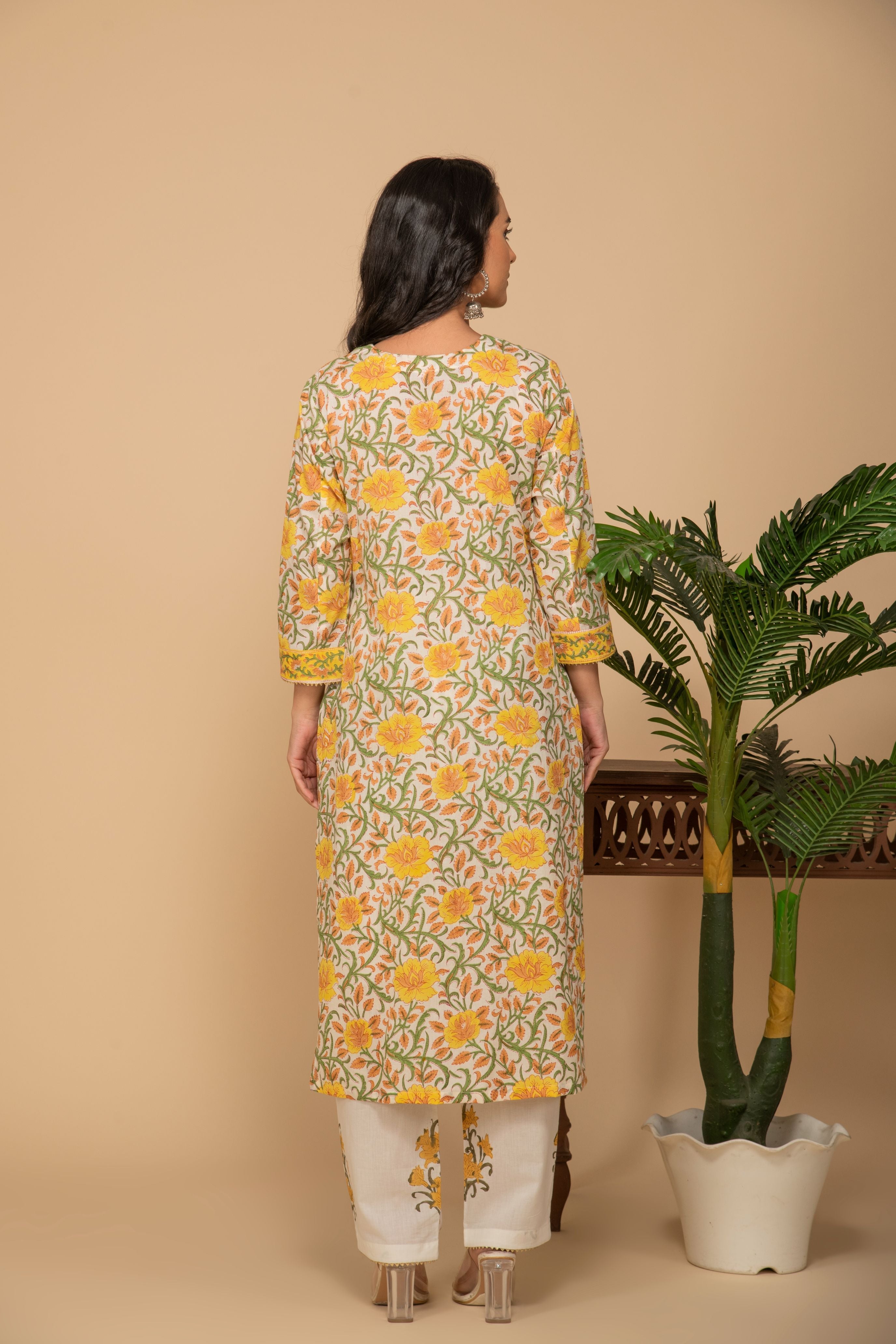 Mustard printed kurta left tie up in front with white printed bottom 3 piece suit set with contrast w/m dupatta