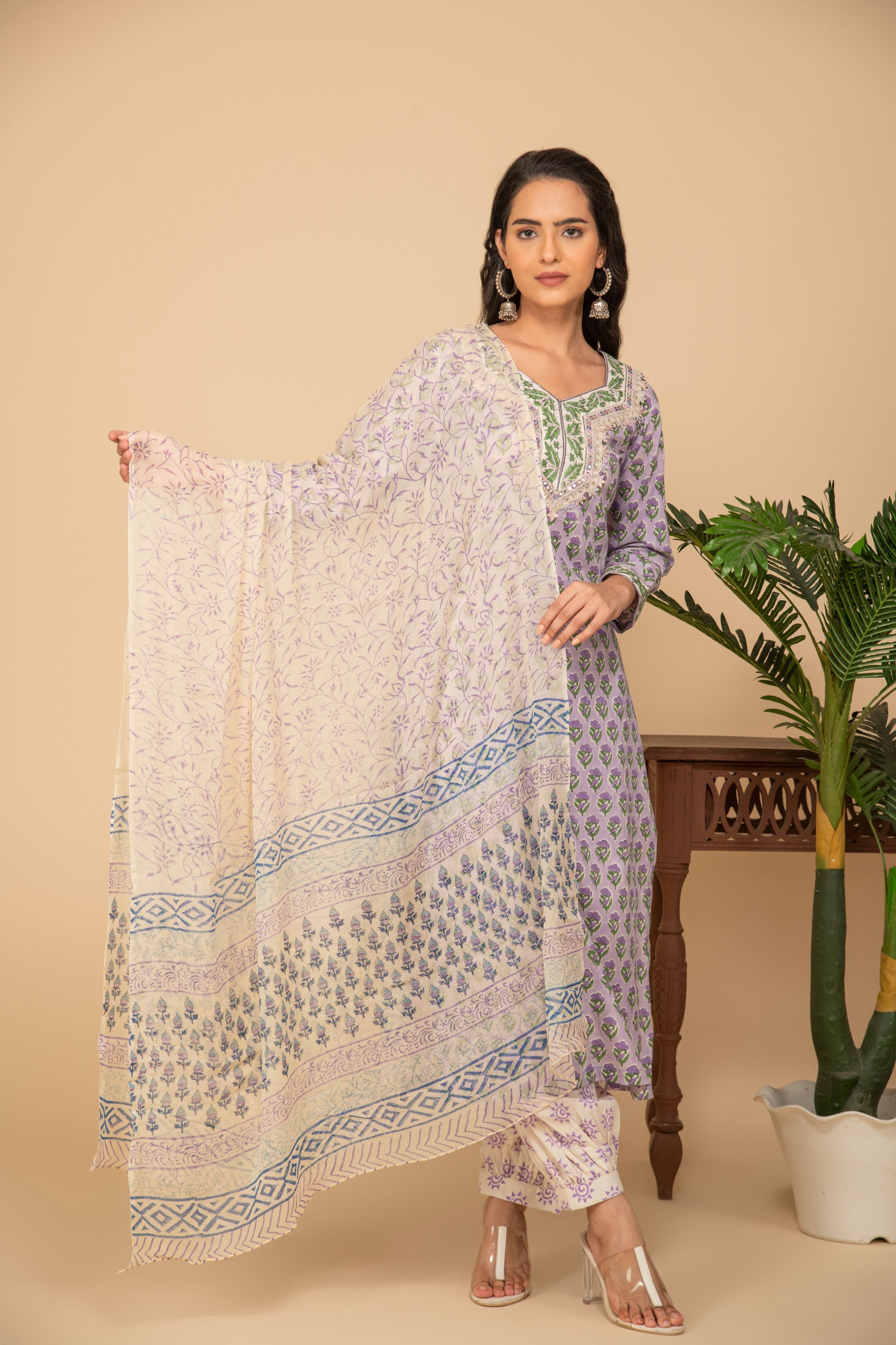 Light purple printed kurta with white printed bottom 3 piece suit set with printed buttis allover dupatta