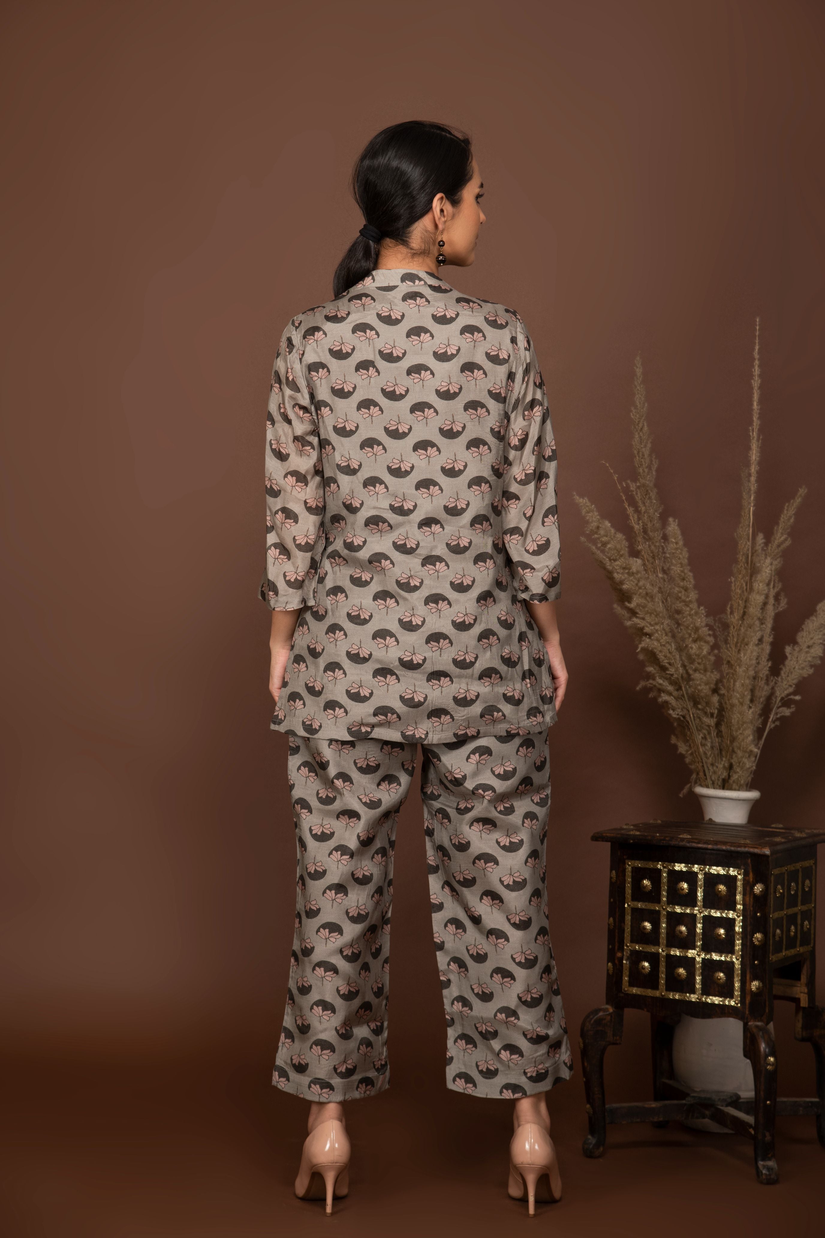 Grey soft muslin with  flower buttis printed top and bottom all over