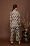 Grey soft muslin with  flower buttis printed top and bottom all over