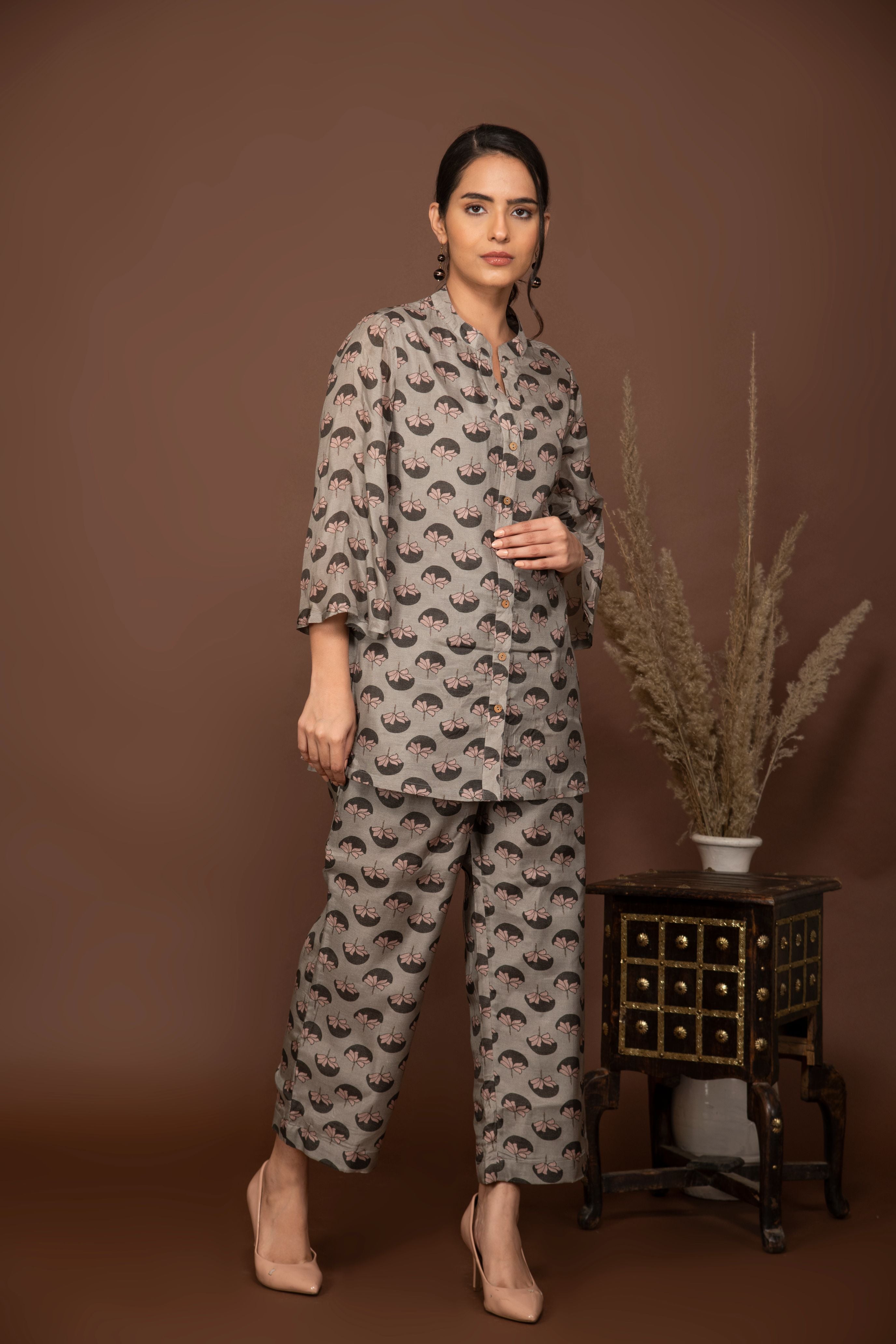 Grey soft muslin with  flower buttis printed top and bottom all over