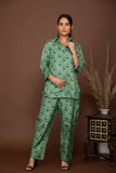 Teal green soft muslin with buttis printed top and bottom all over