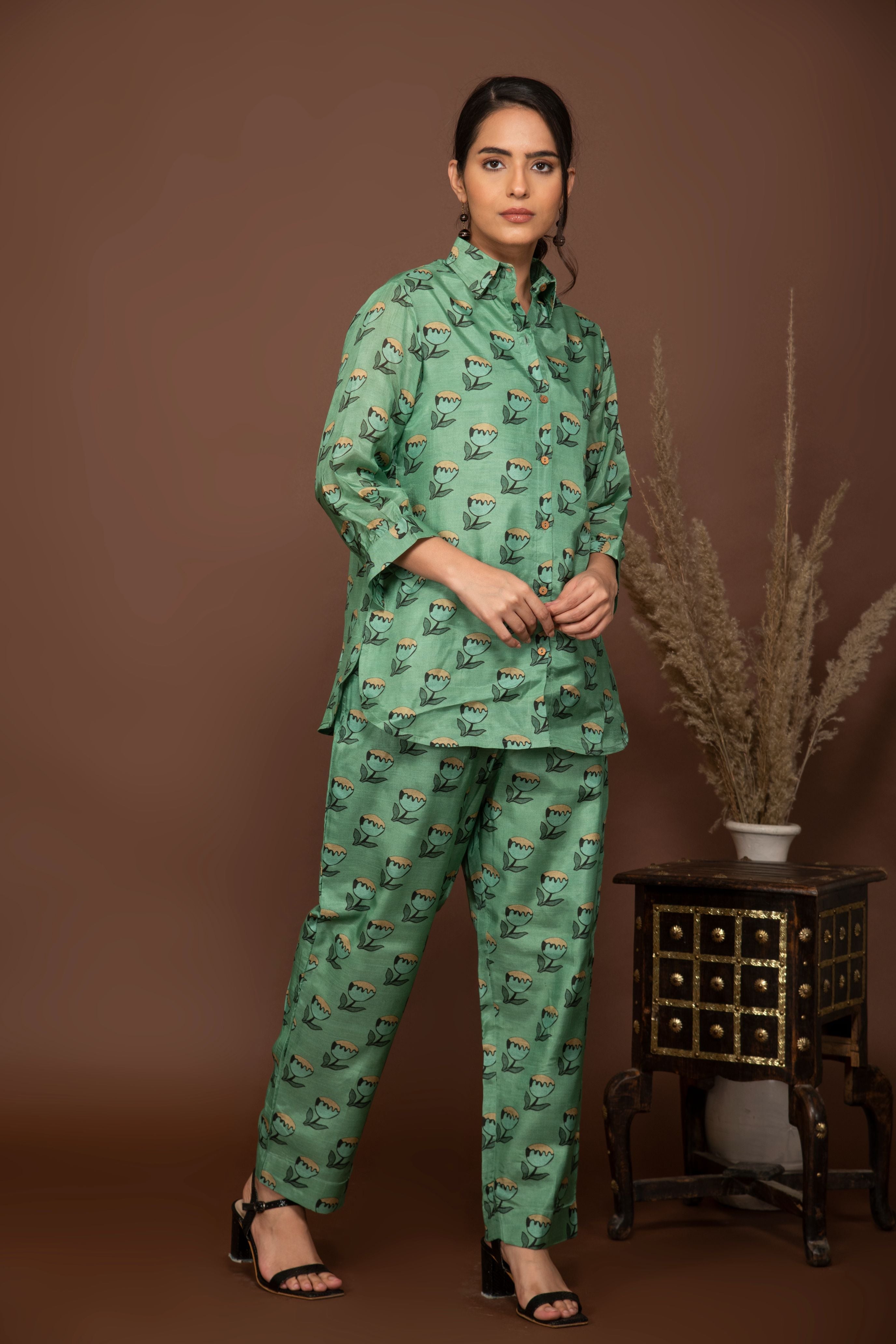 Teal green soft muslin with buttis printed top and bottom all over