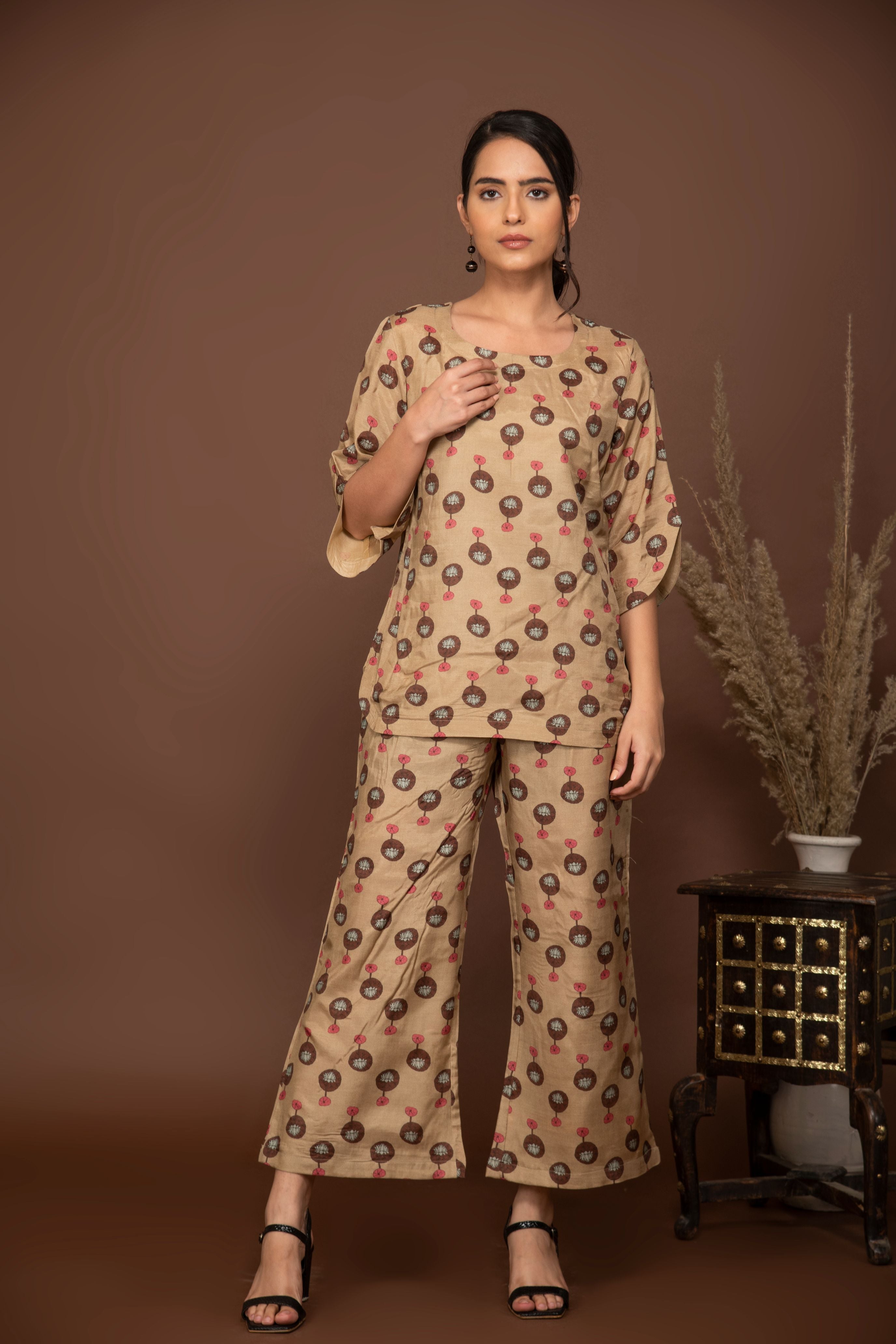 Nude brown soft muslin with bold flower printed top and bottom with belt