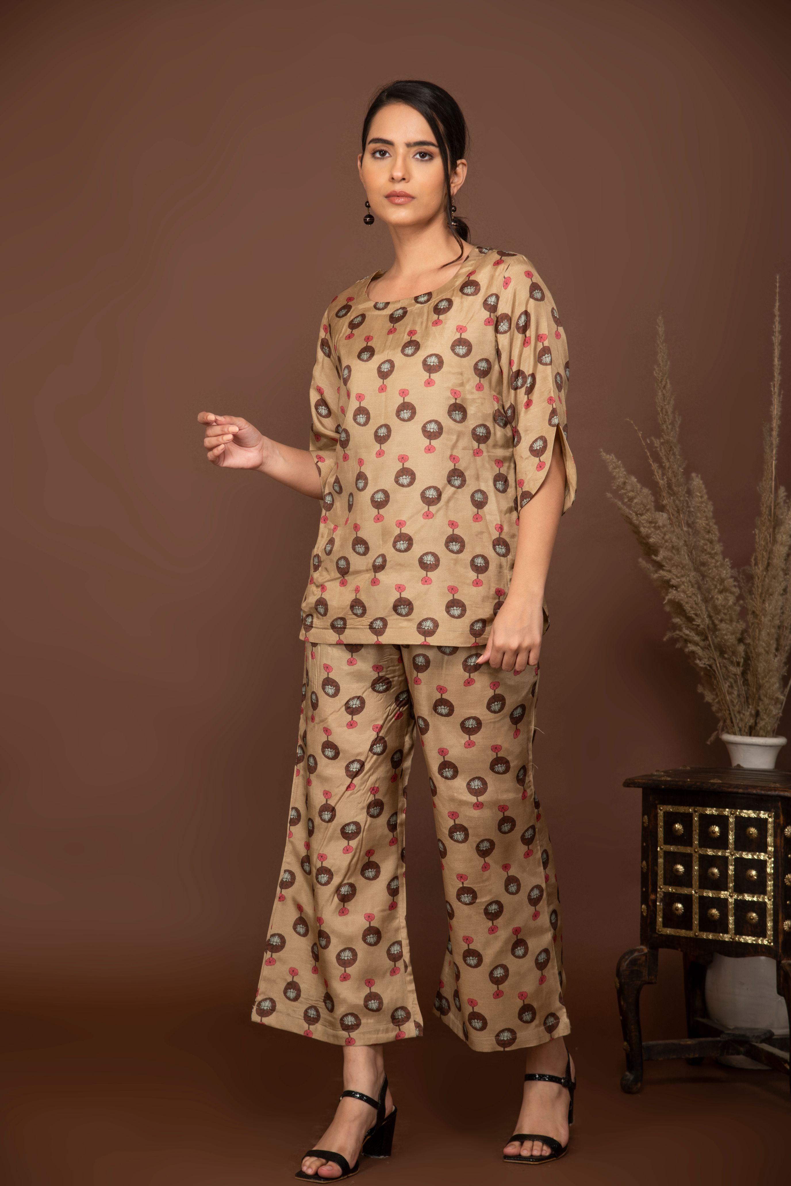 Nude brown soft muslin with bold flower printed top and bottom with belt