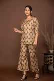 Nude brown soft muslin with bold flower printed top and bottom with belt