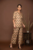 Nude brown soft muslin with bold flower printed top and bottom with belt