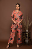 Peach soft muslin with bold flower printed top with butti printed bottom