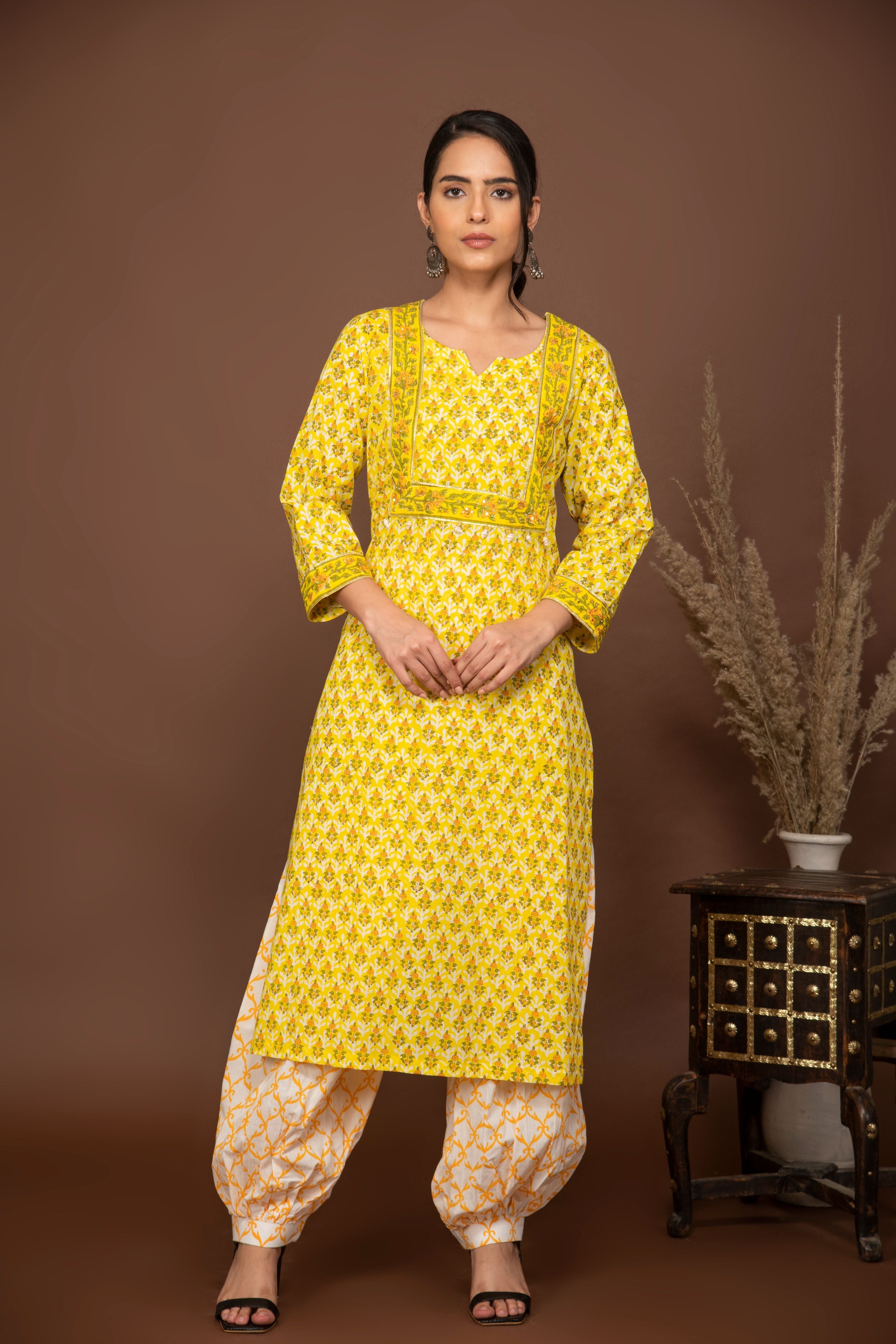 Yellow floral printed kurta with white/mustard printed bottom 3 piece suit set with printed buttis all over dupatta