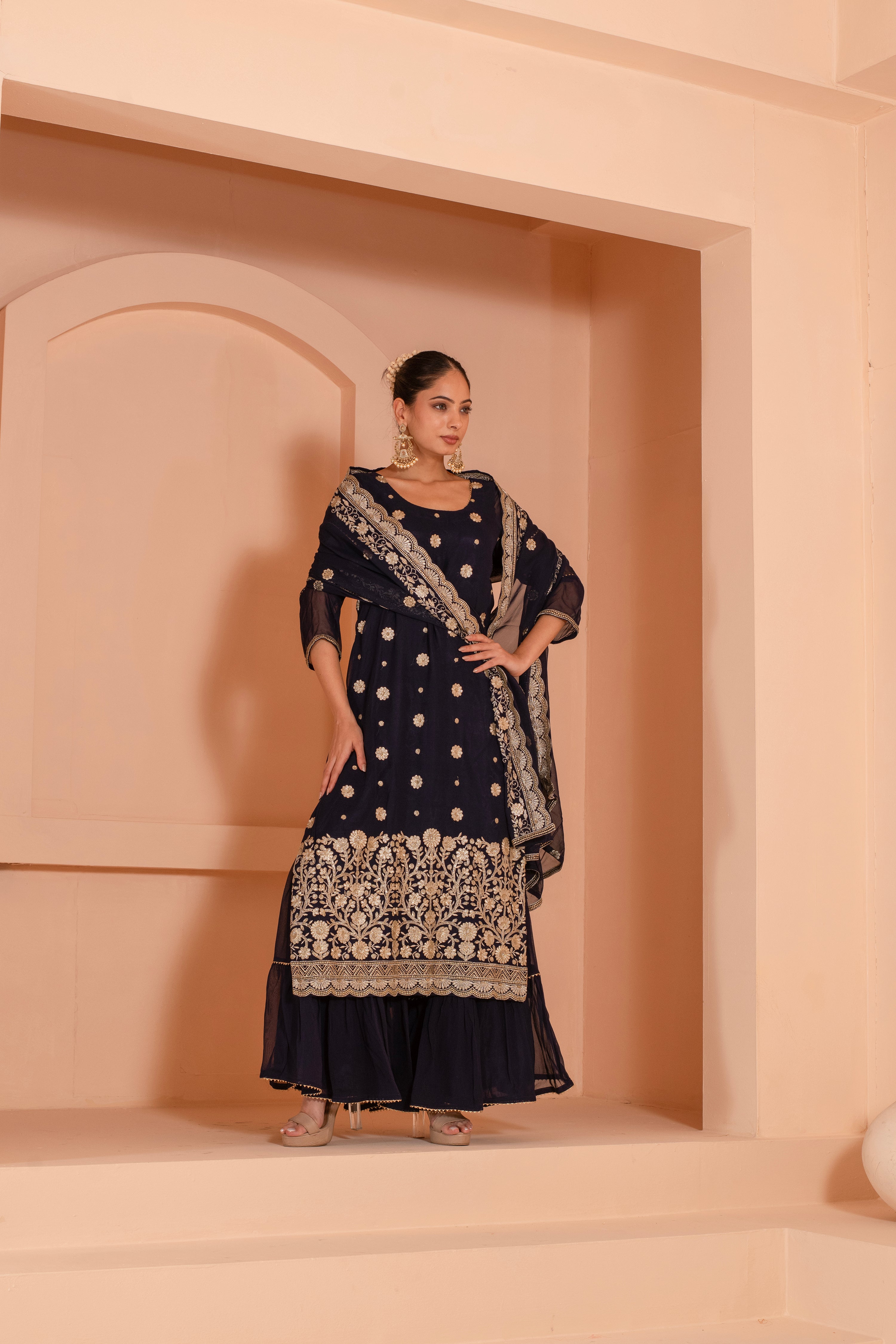 Versatile embroidered dupatta set with flared bottom and embroidered dupatta.