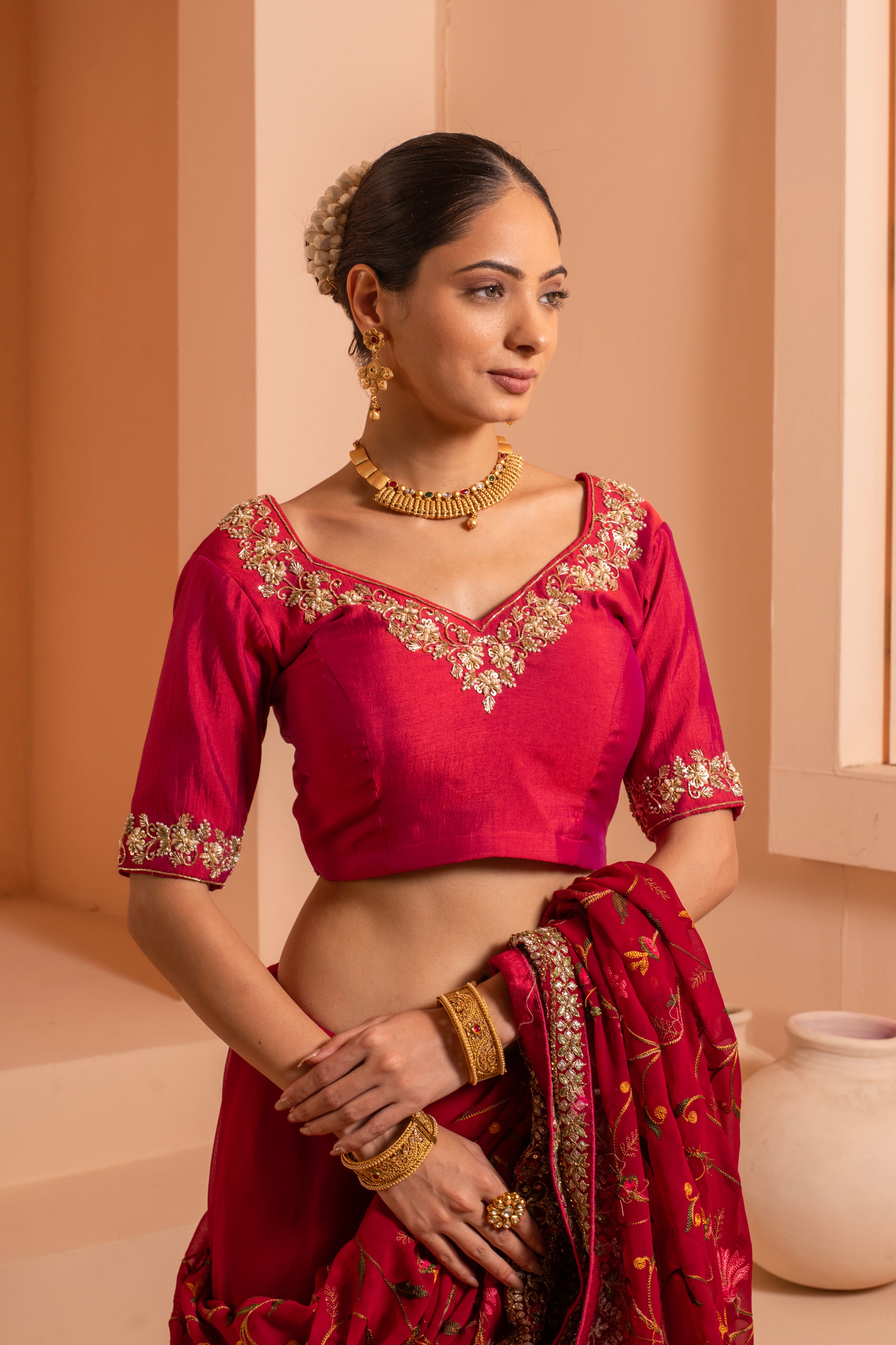 Scarlet spendor saree for a bold red saree with intricate embroidery