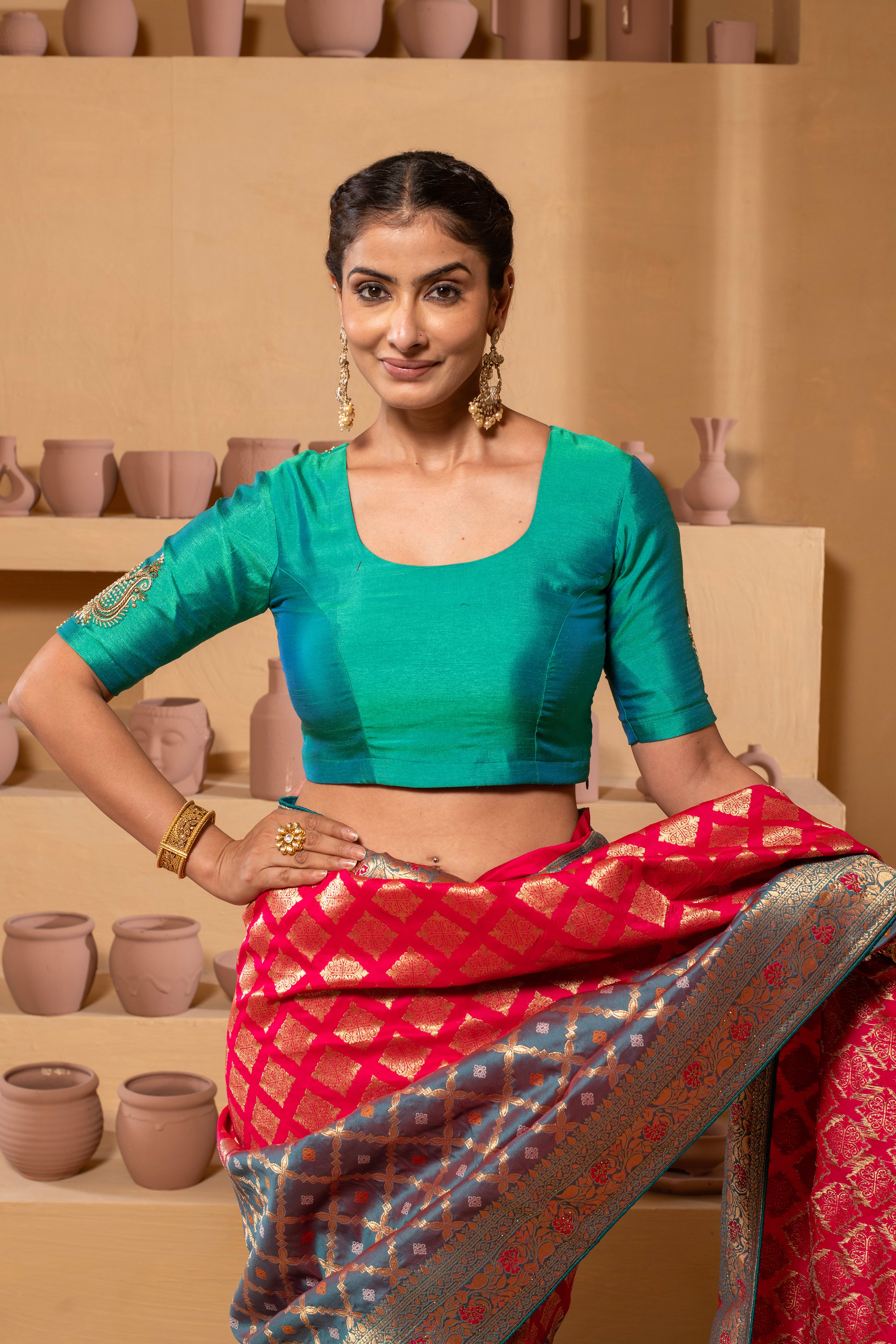 Silk blouse with intricate embroidery on the sleeves and back