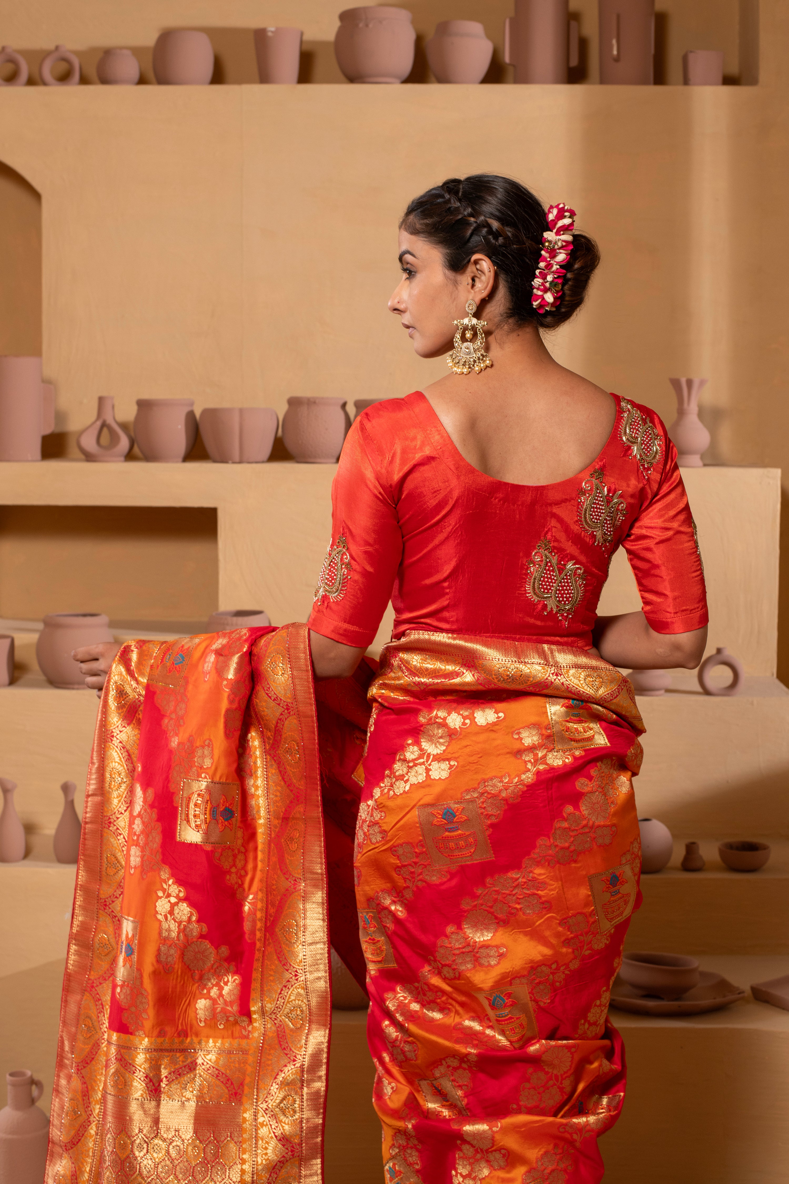 Silk blouse with intricate embroidery on the sleeves and back