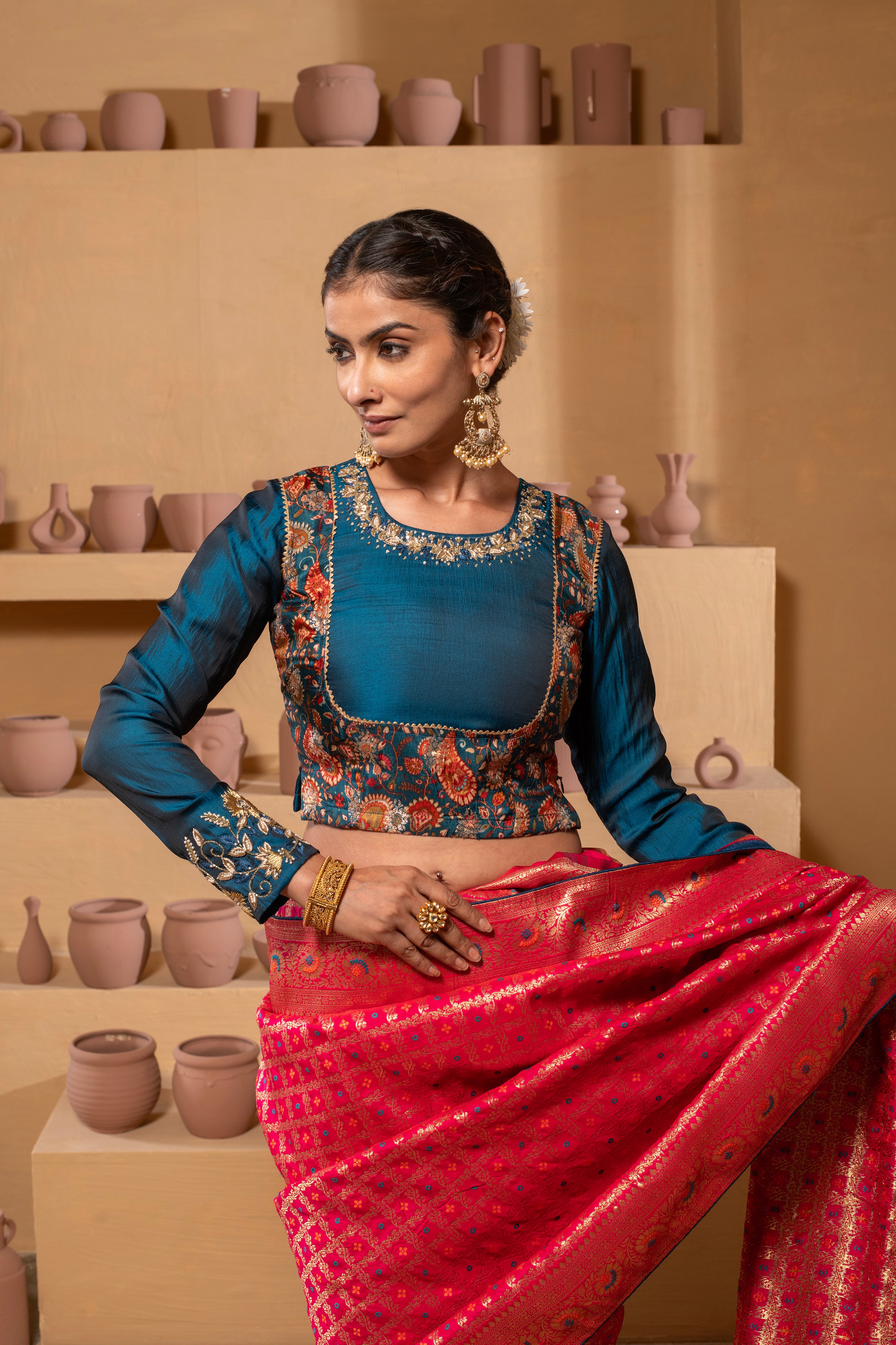Versatile wear Silk blouse with intricate hand-embroidered detailing.