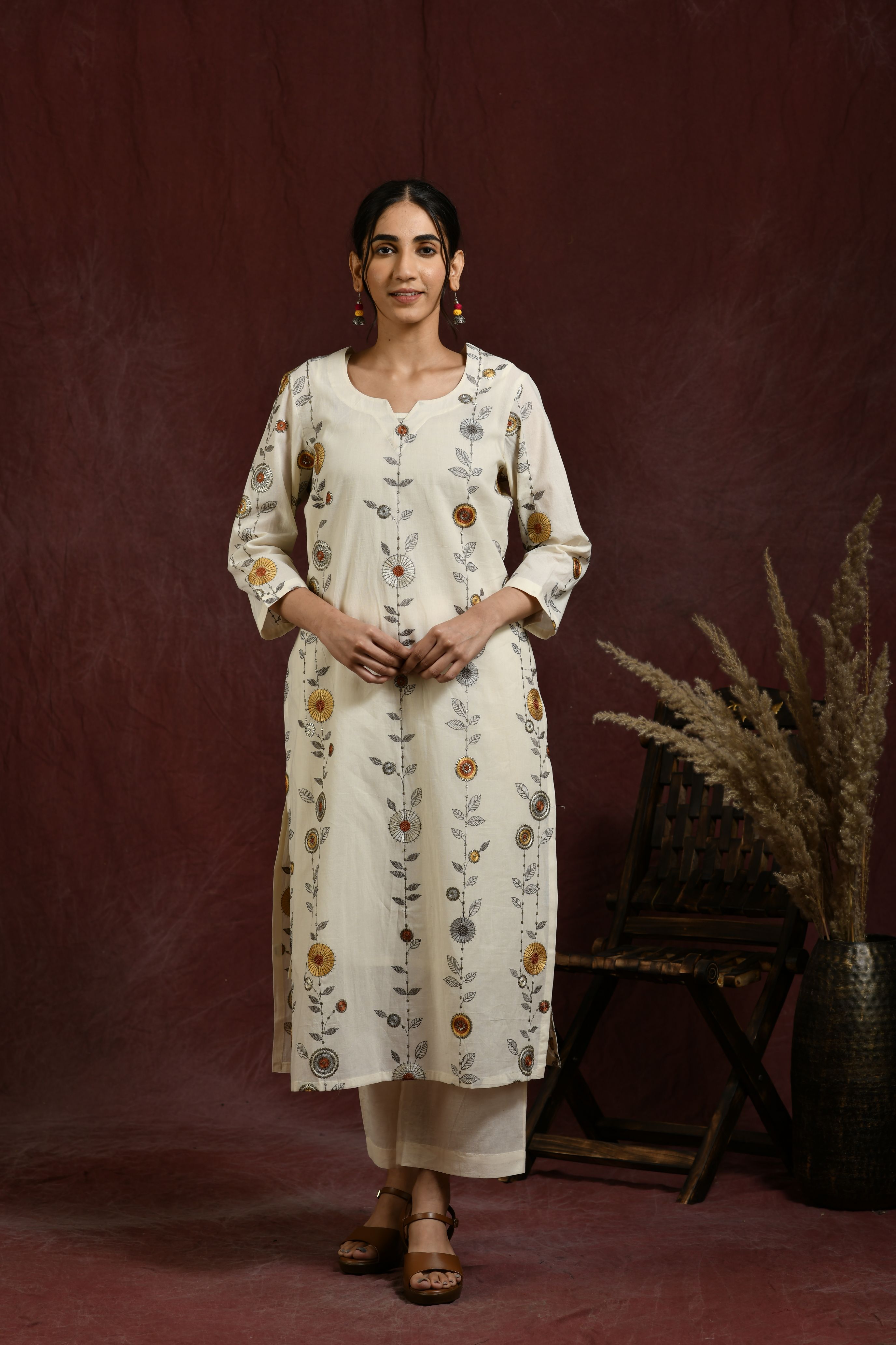 White and  mustard flower embroidered kurta and pant set