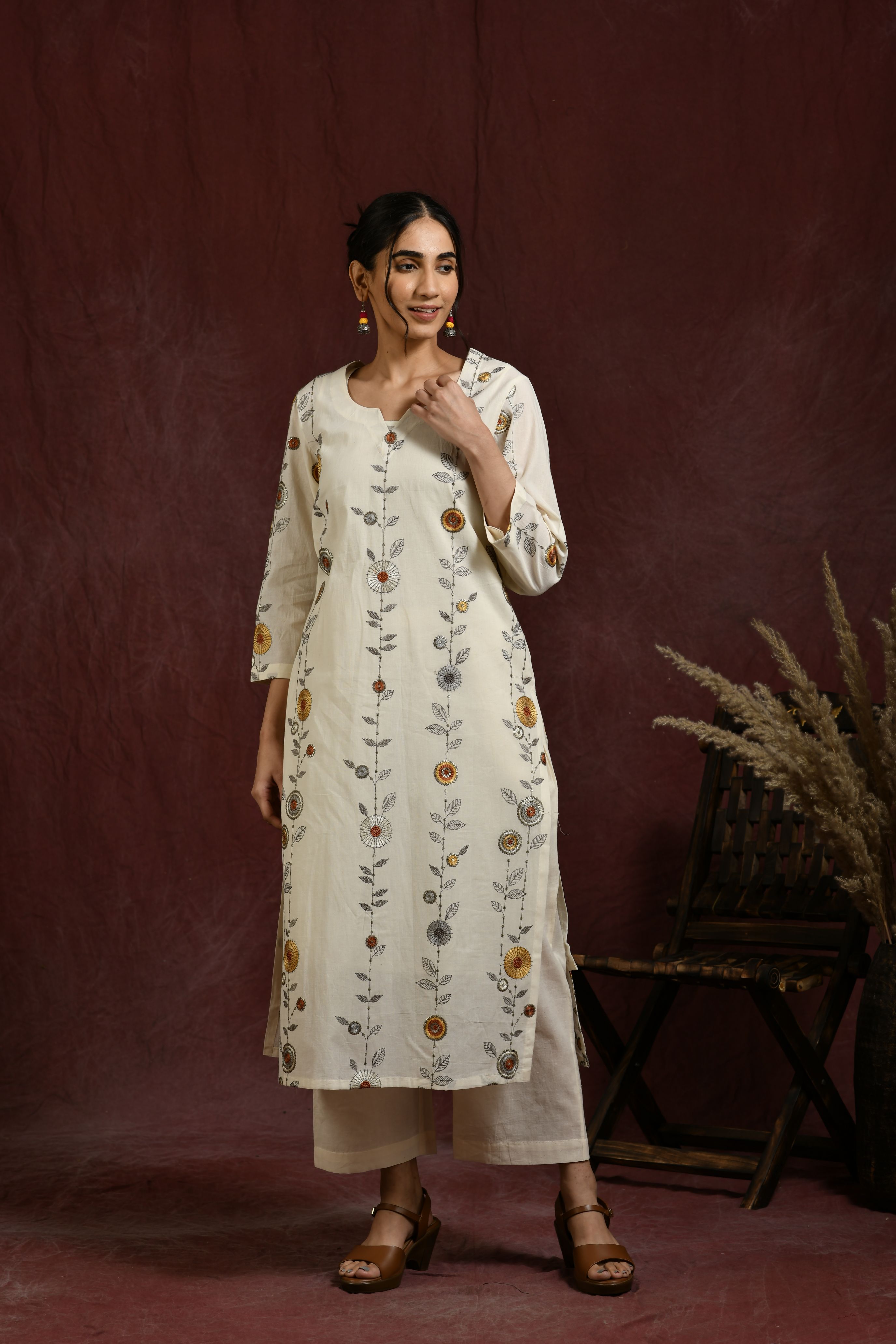 White and  mustard flower embroidered kurta and pant set