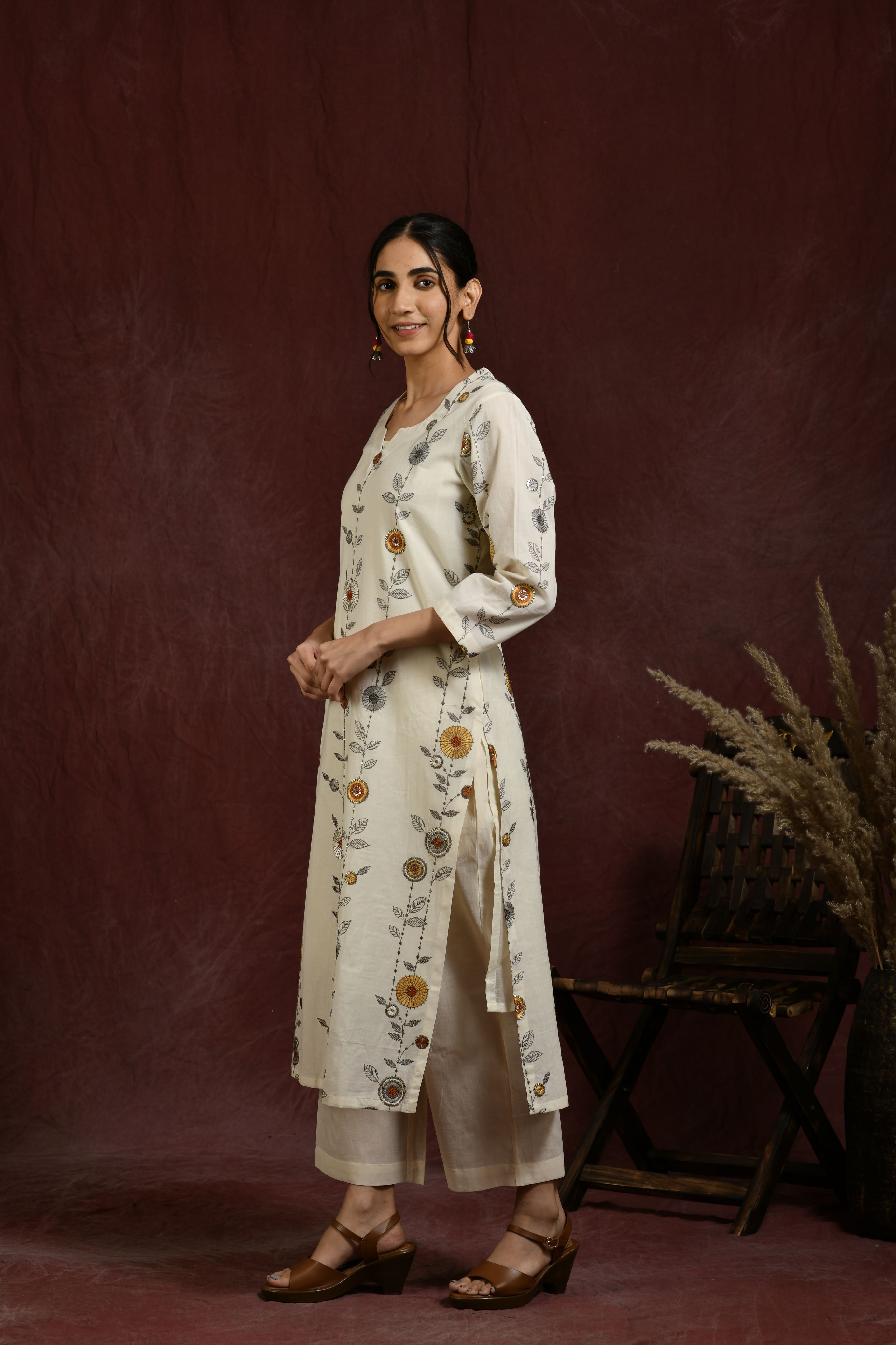 White and  mustard flower embroidered kurta and pant set