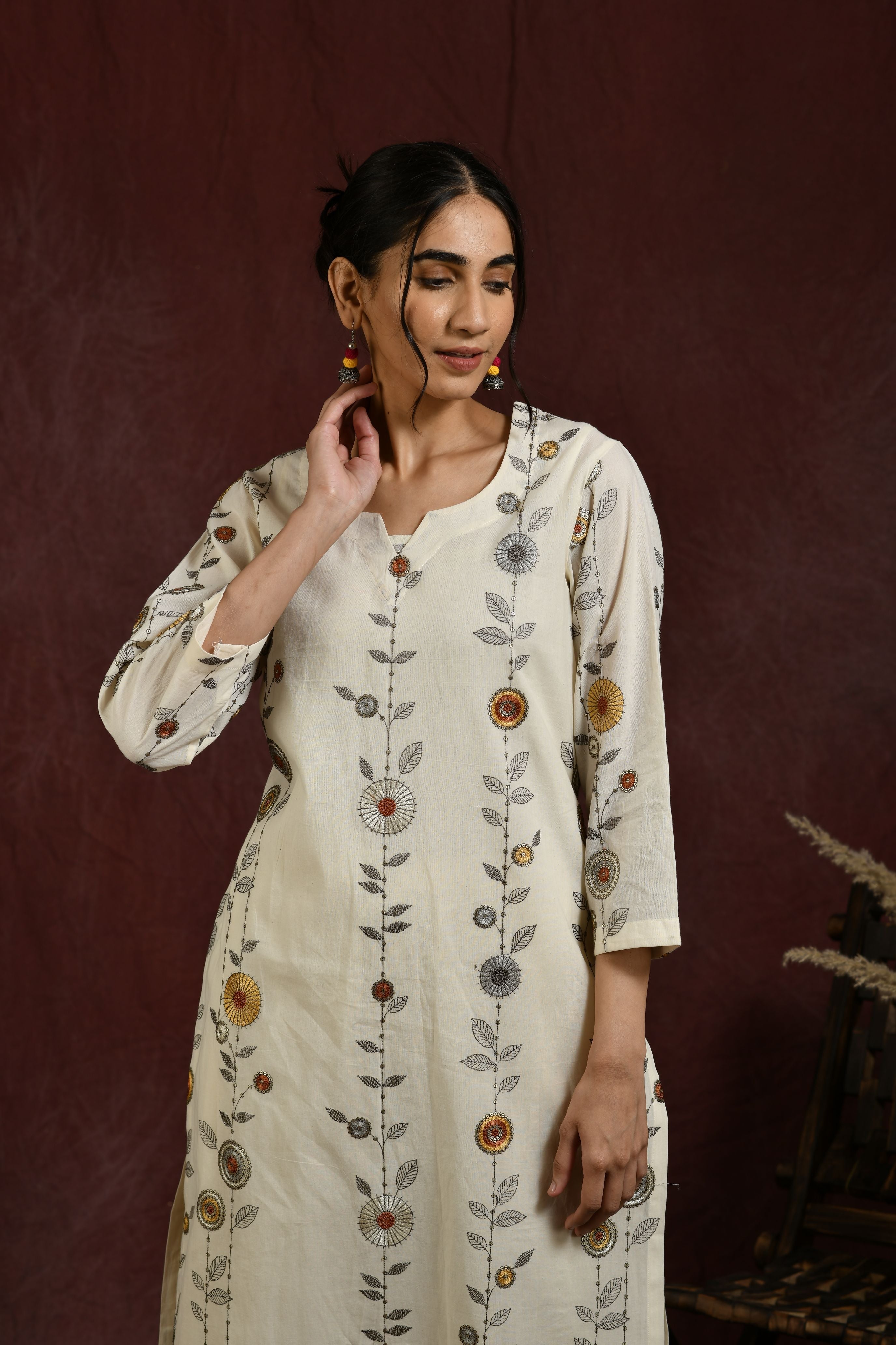 White and  mustard flower embroidered kurta and pant set