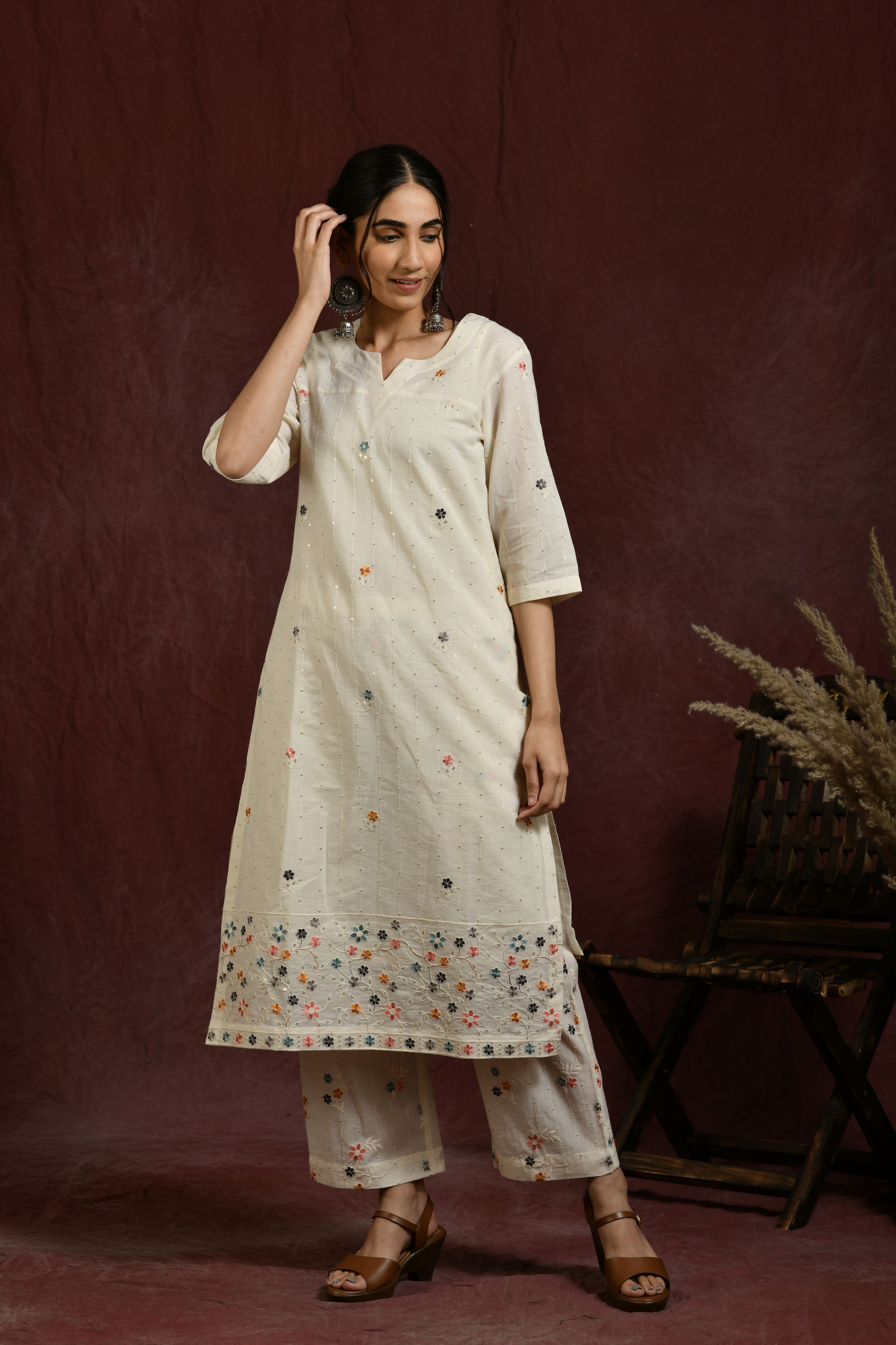 White and multi flower embroidered kurta and pant set