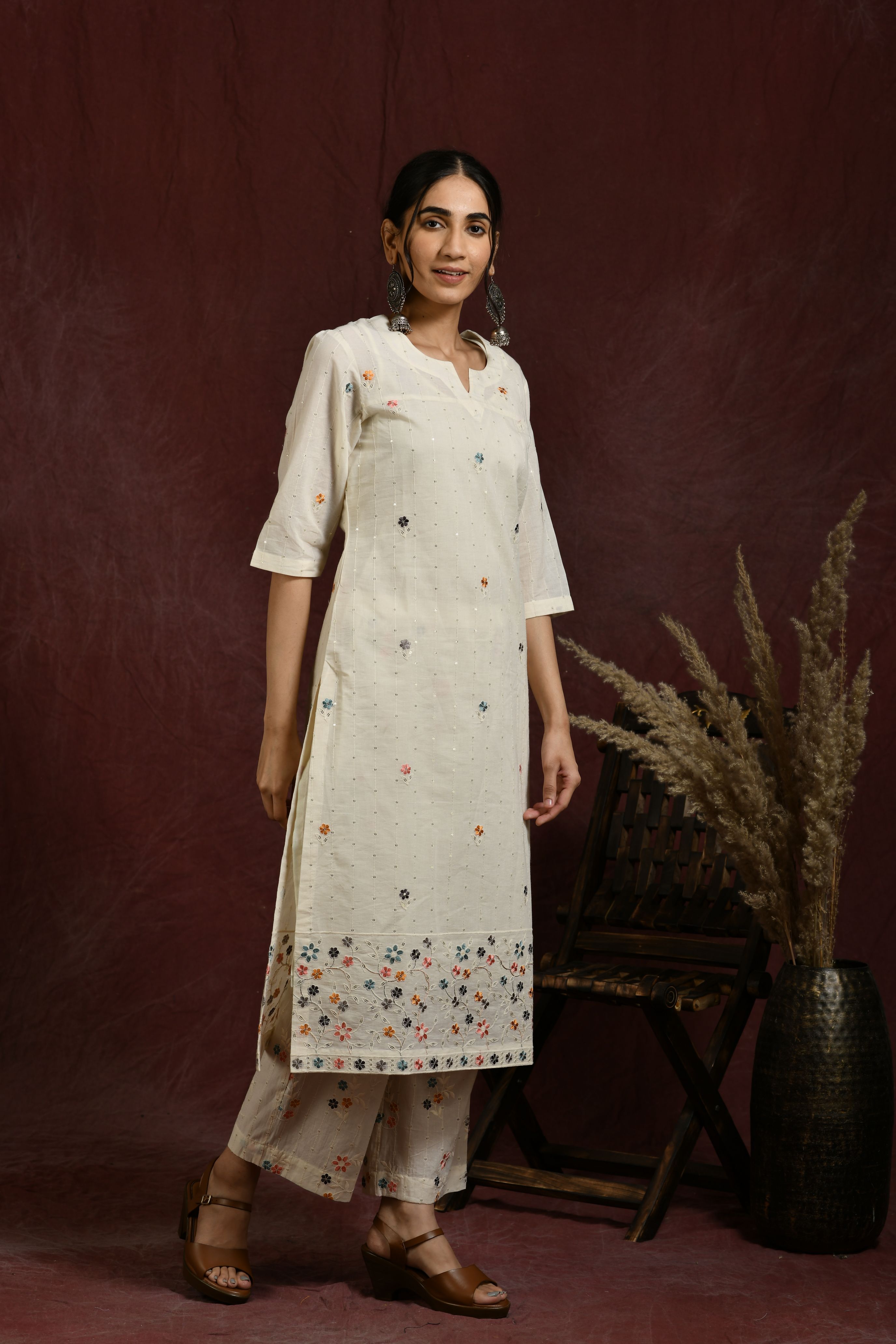White and multi flower embroidered kurta and pant set