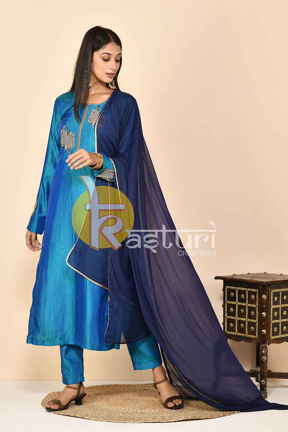 Peacock blue embroiderd silk kurta with pant set