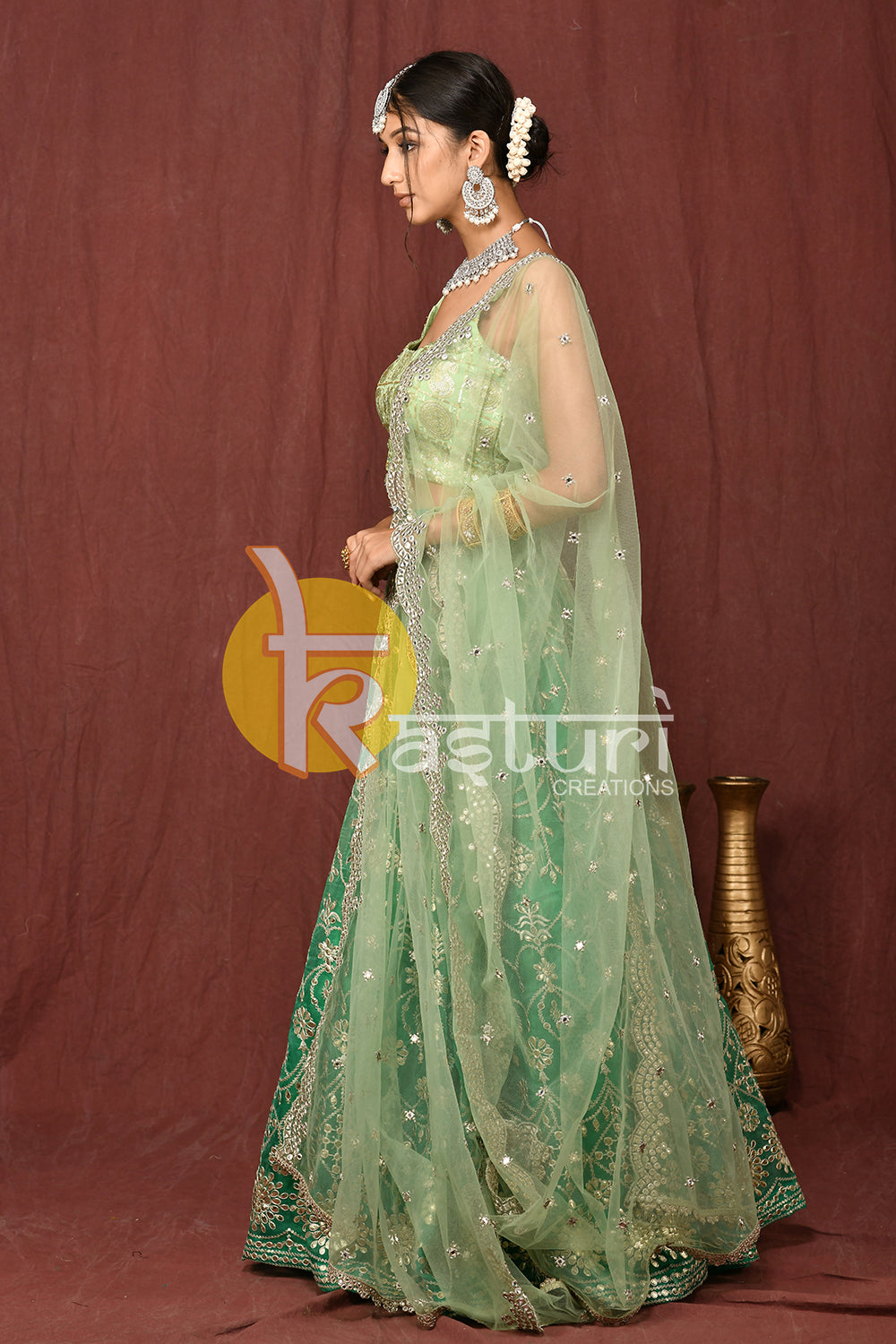 Sea green heavy embroidered lehenga choli set