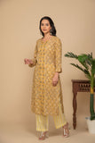 Mustard printed kurta with yellow printed bottom 3 piece suit set with contrast w/m dupatta.