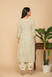 White buttis printed kurta with white/mustard printed bottom 3 piece suit set with contrasting mustard printed scallops all over dupatta.