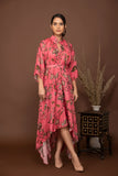 Pink soft muslin bold prints high-low dress with tie up belt.