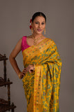 Banarasi sarees with contrast color weaves and a blouse.