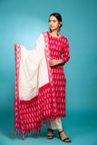 Pink ikkat kurta with white bottom 3 piece suit set with contrast p/w ikkat buttis all over dupatta.