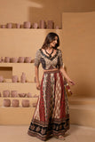 Ajrakh handblock pure cotton Flaired Lehnga set in rich rust and black hues with a play of patterns and mirror embroidery and patchwork with a traditional charm.