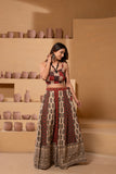 Ajrakh handblock pure cotton Flaired Lehnga set in rich rust and black hues with a play of patterns and mirror embroidery and patchwork with a traditional charm.