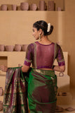 Silk blouse with embroidery on the neckline and sleeves, with a stylish, detailed back design