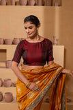 Silk blouse with intricate embroidery on the sleeves and back