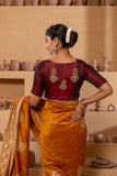 Silk blouse with intricate embroidery on the sleeves and back