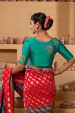 Silk blouse with intricate embroidery on the sleeves and back