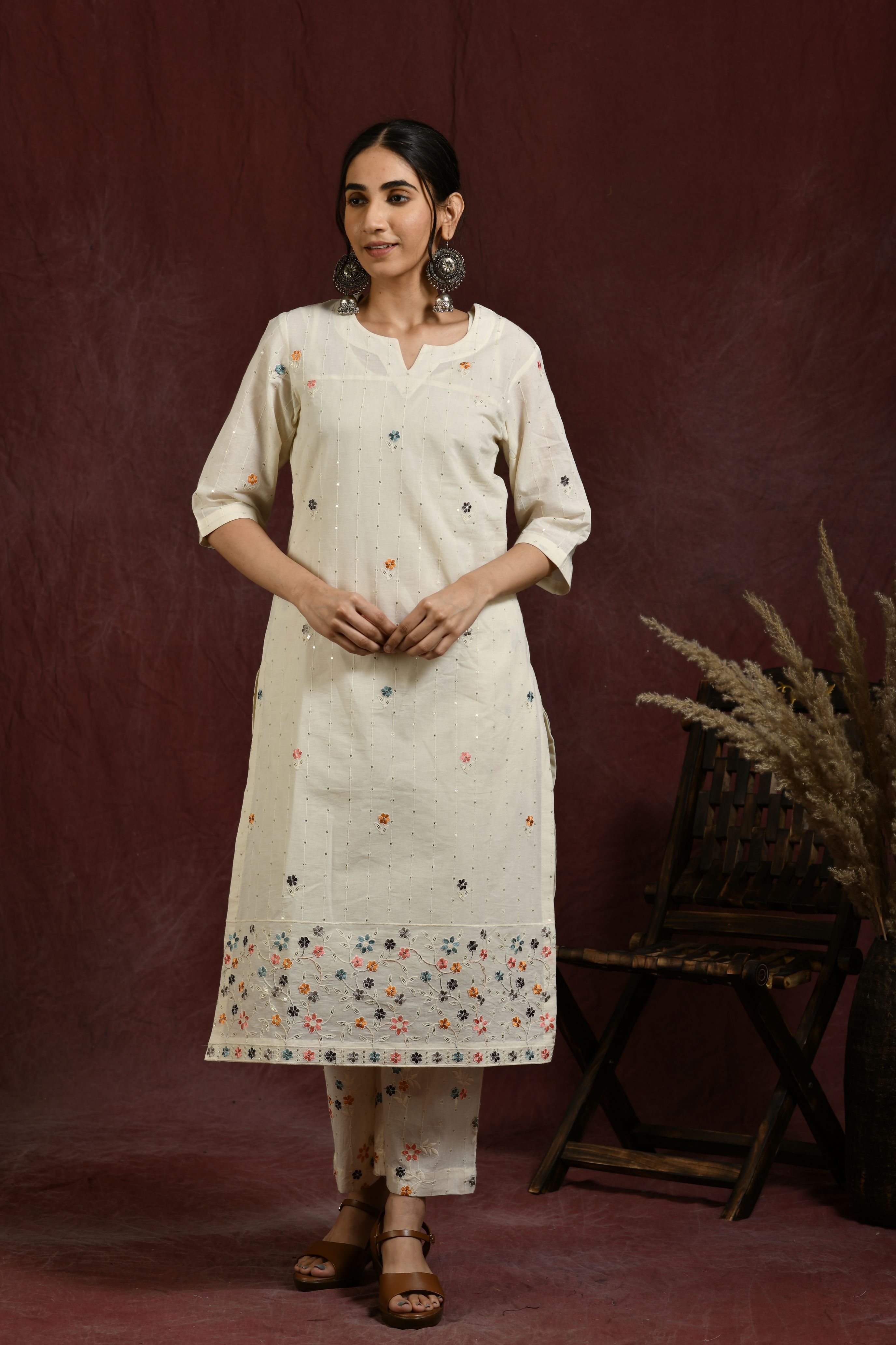 White and multi flower embroidered kurta and pant set