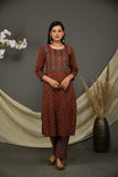 Maroon cotton jaipuri printed kurta pants with zig zag printed dupatta.