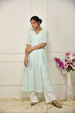 Green georgette thread embroidered flared top with a front slit and a yoke lining