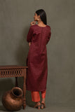 Ajrakh handblock pure cotton kurta and dupatta set with embroidered  necklineand a white cotton bottom.