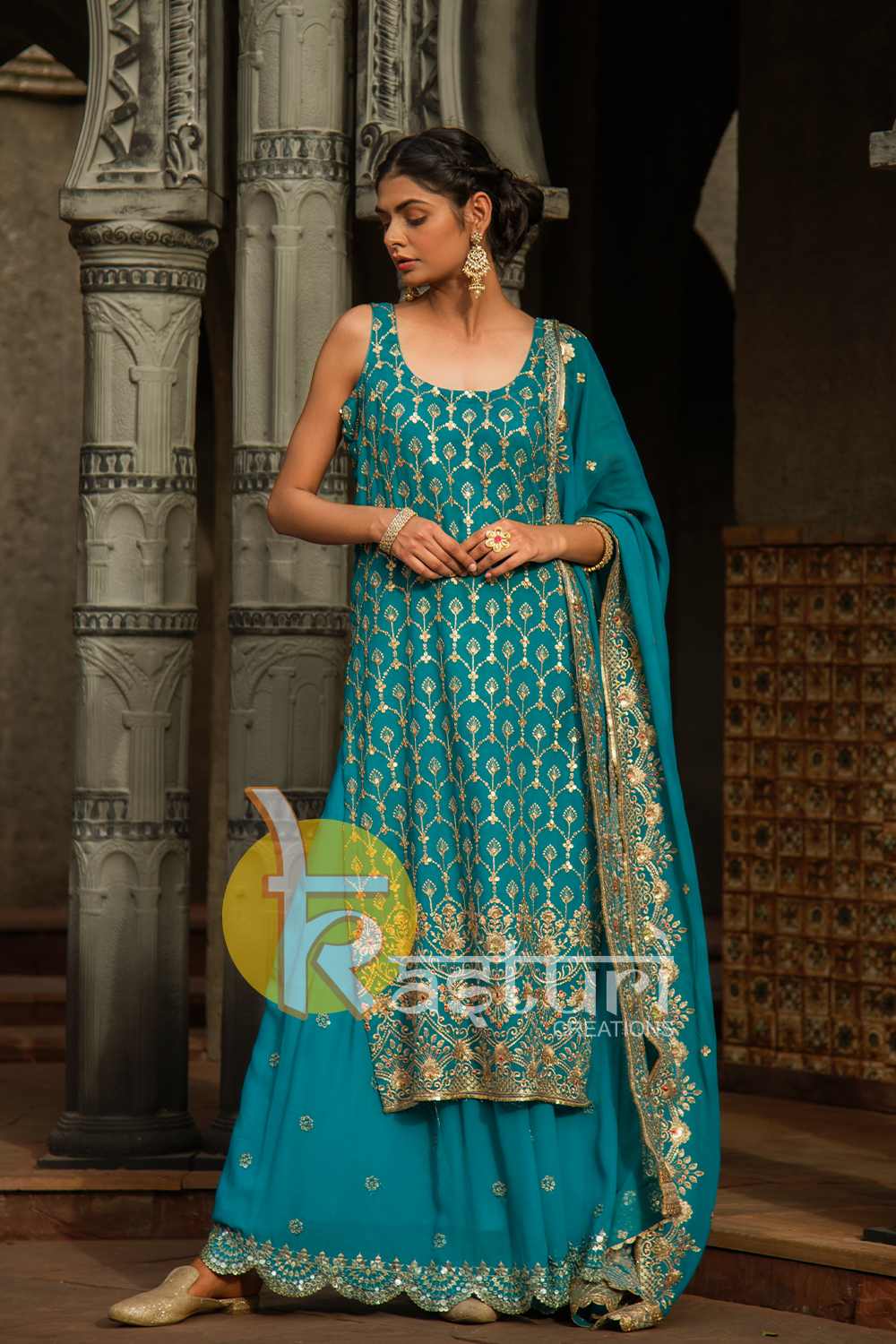 Blue heavy embroidered georgette kurta and palazzo set