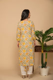 Mustard printed kurta left tie up in front with white printed bottom 3 piece suit set with contrast w/m dupatta.
